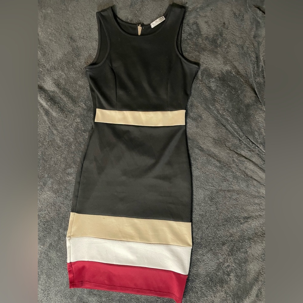 Slim fitted dress, size small, with a satin texture